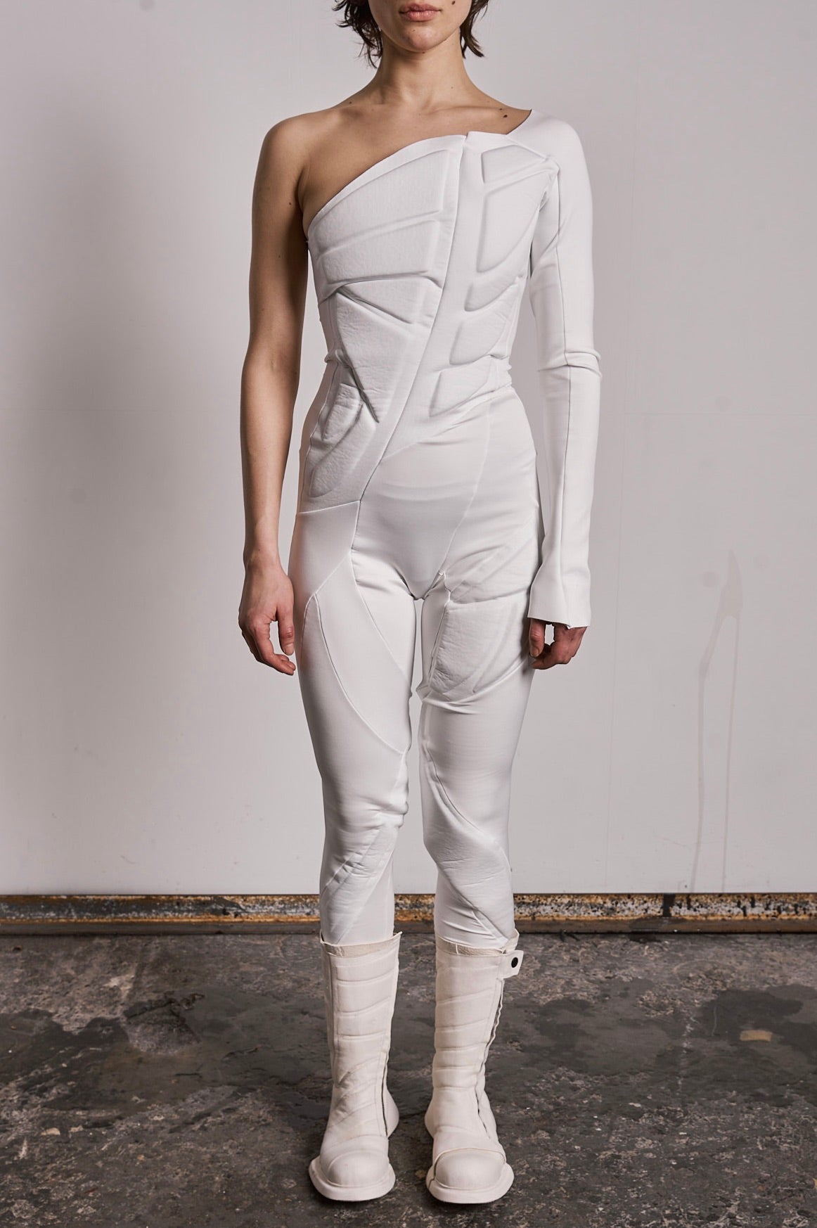 DISTORTION PADDED ONESIE