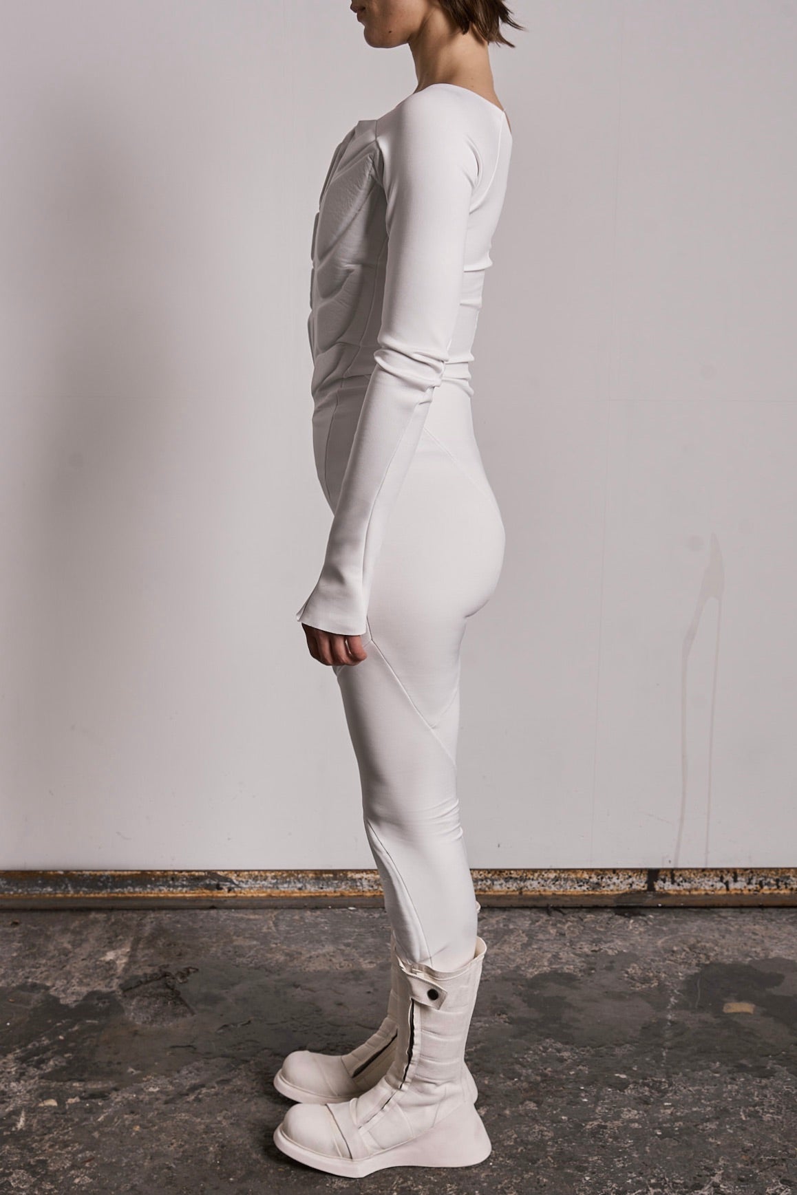 DISTORTION PADDED ONESIE