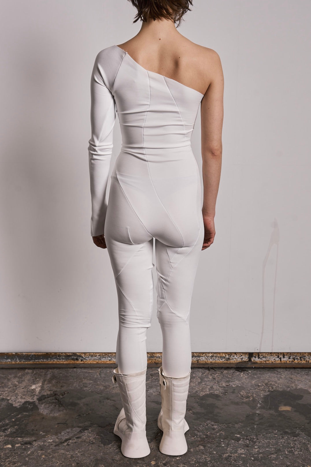 DISTORTION PADDED ONESIE