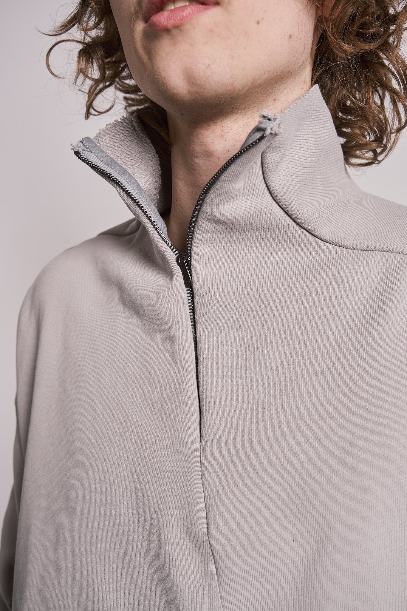 DISTORTION HALF ZIP SWEATER