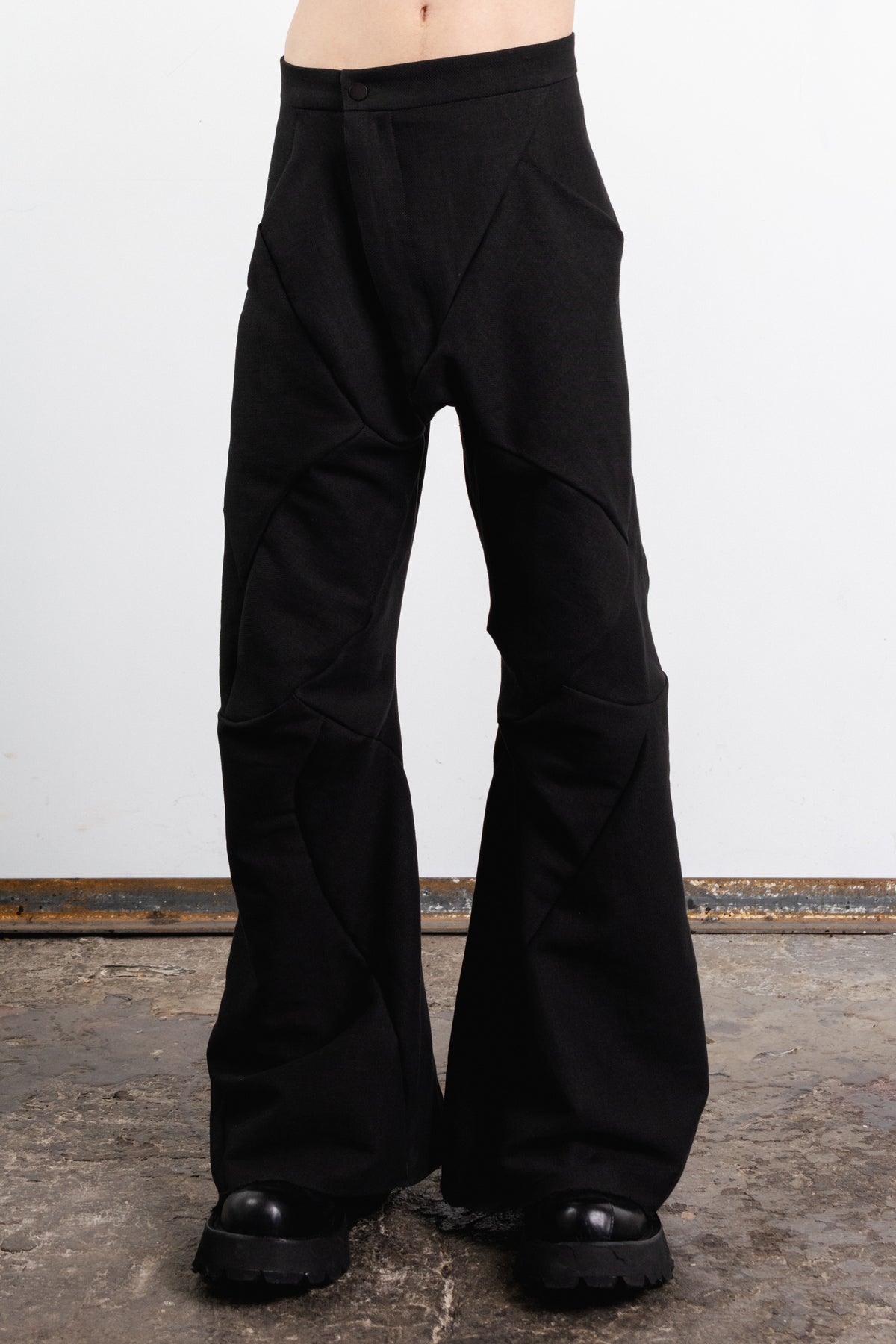 DISTORTION FLARED BAGGY PANTS