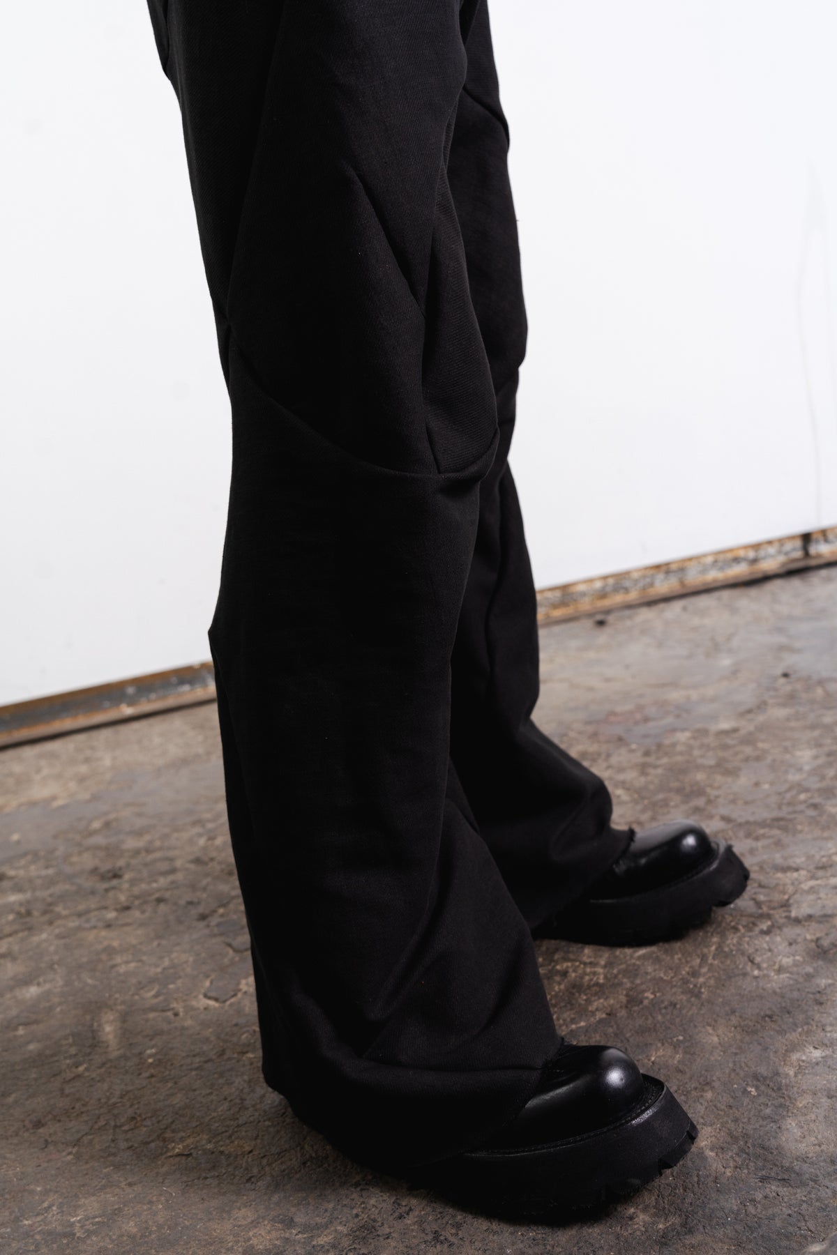 DISTORTION FLARED BAGGY PANTS