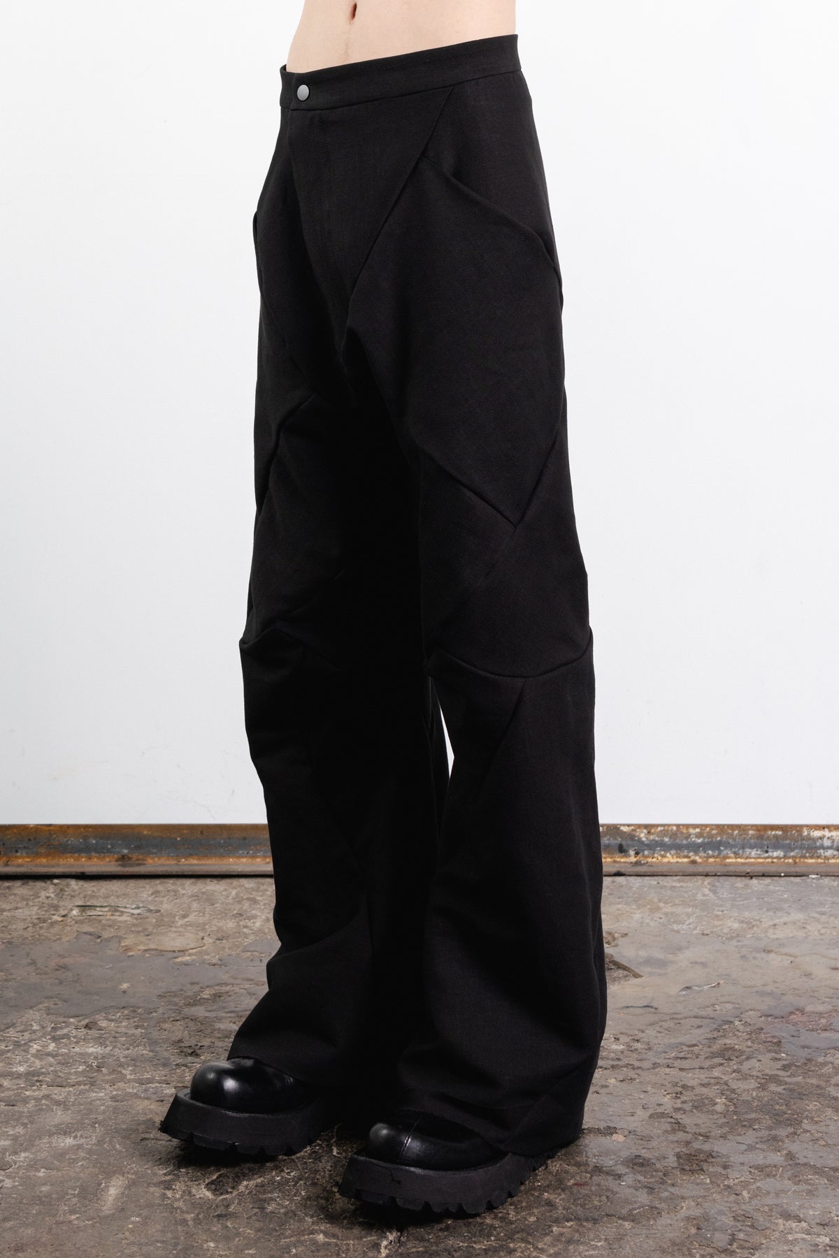DISTORTION FLARED BAGGY PANTS