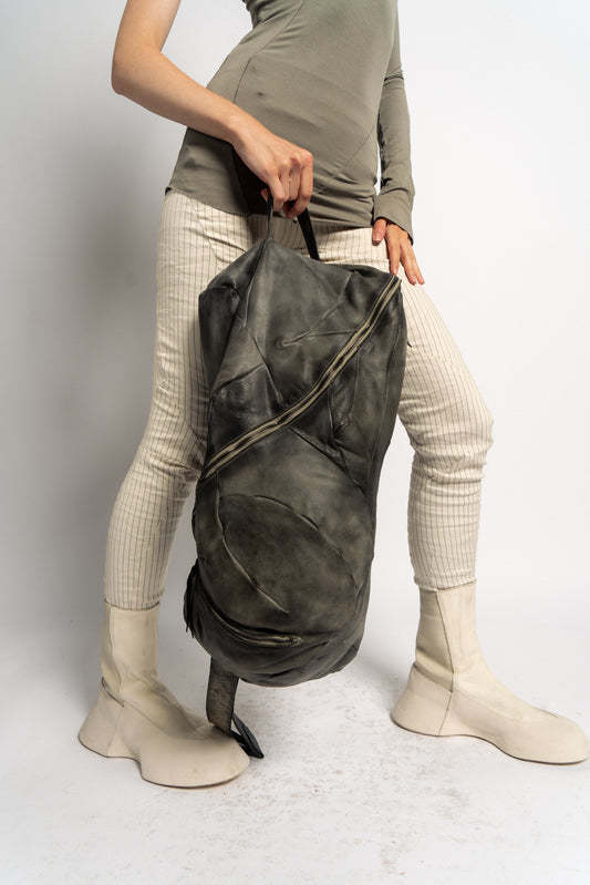 DISTORTION PREGNANT LADY BACKPACK